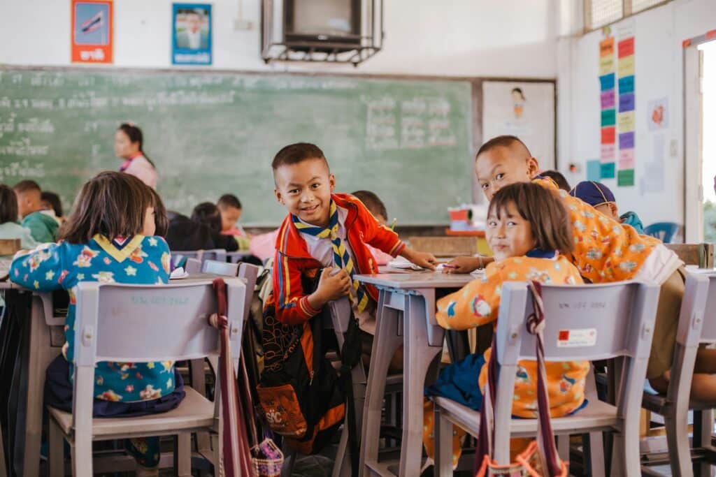 Children learning in class with the help of back to school resources